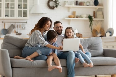 bigstock-Happy-Family-With-Kids-Sit-On--353463041